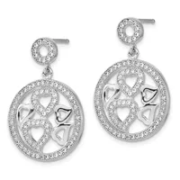 Pair of silver dangle earrings featuring circular frames with cubic zirconia borders and open heart designs, suspended from matching circular studs.