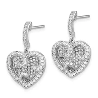 A pair of silver heart-shaped drop earrings with diamond pave settings and curved stems, displayed side by side.