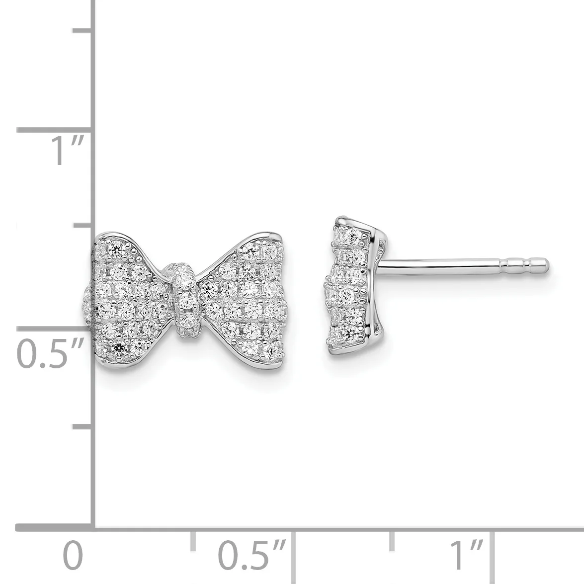 A pair of silver bow-tie shaped stud earrings with diamond pave settings, shown front and side view with a measurement scale indicating approximately half an inch width.