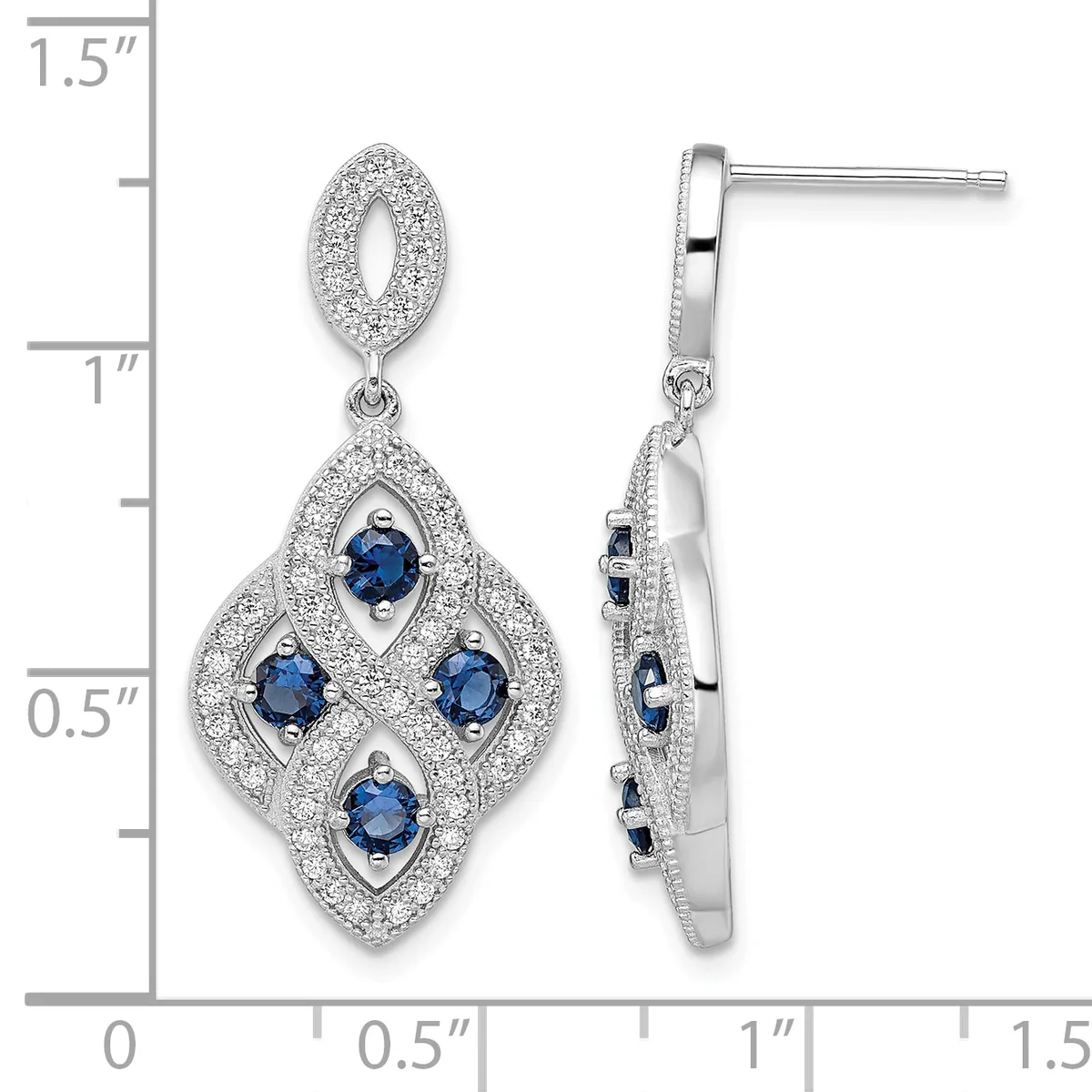 Pair of diamond and sapphire drop earrings with diamond-paved oval tops and diamond-paved quatrefoil bottoms set with four round sapphires, shown front and side view with measurement scale.
