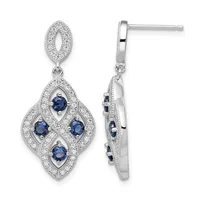 Pair of silver drop earrings with oval tops and diamond-shaped pendants set with four round blue sapphires surrounded by small diamonds, shown from front and side views.