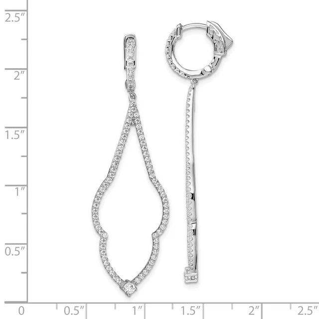 A pair of silver drop earrings with cubic zirconia stones displayed next to a measurement ruler, showing they are approximately two inches long.