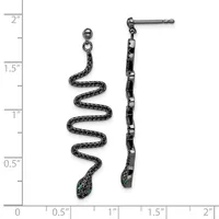 A pair of black textured snake-shaped drop earrings with green stone accents on the posts, displayed against a ruler showing approximately two inches in length.