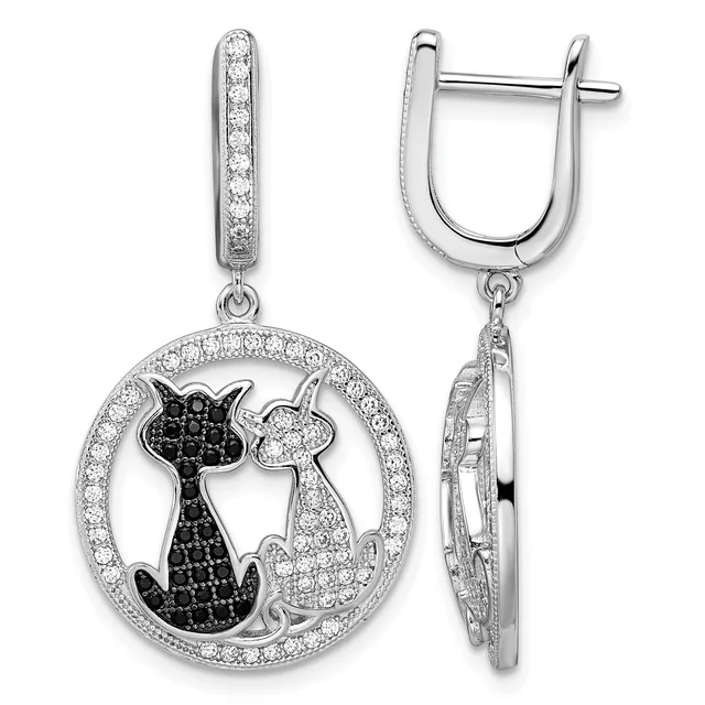 Pair of silver drop earrings featuring circular pendant with black and white gemstones arranged in cat silhouettes, shown front and back views.