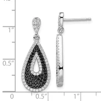 Pair of sterling silver teardrop dangle earrings with black and white diamonds, shown front and back against a measurement scale.