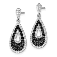 Pair of teardrop-shaped dangling earrings with black and white diamonds set in white metal, shown against a white background.