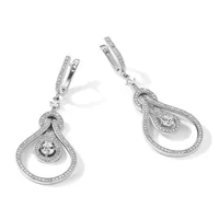 Pair of silver drop earrings with teardrop-shaped frames outlined in small diamonds, each suspending a round diamond from a hinged post closure.