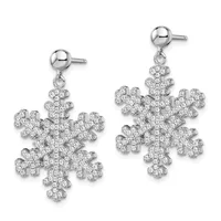A pair of silver snowflake-shaped dangle earrings with cubic zirconia stones set throughout, displayed on white background.