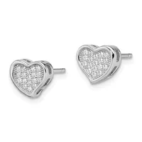 A pair of heart-shaped stud earrings in white metal filled with pavé diamonds, shown from the front.