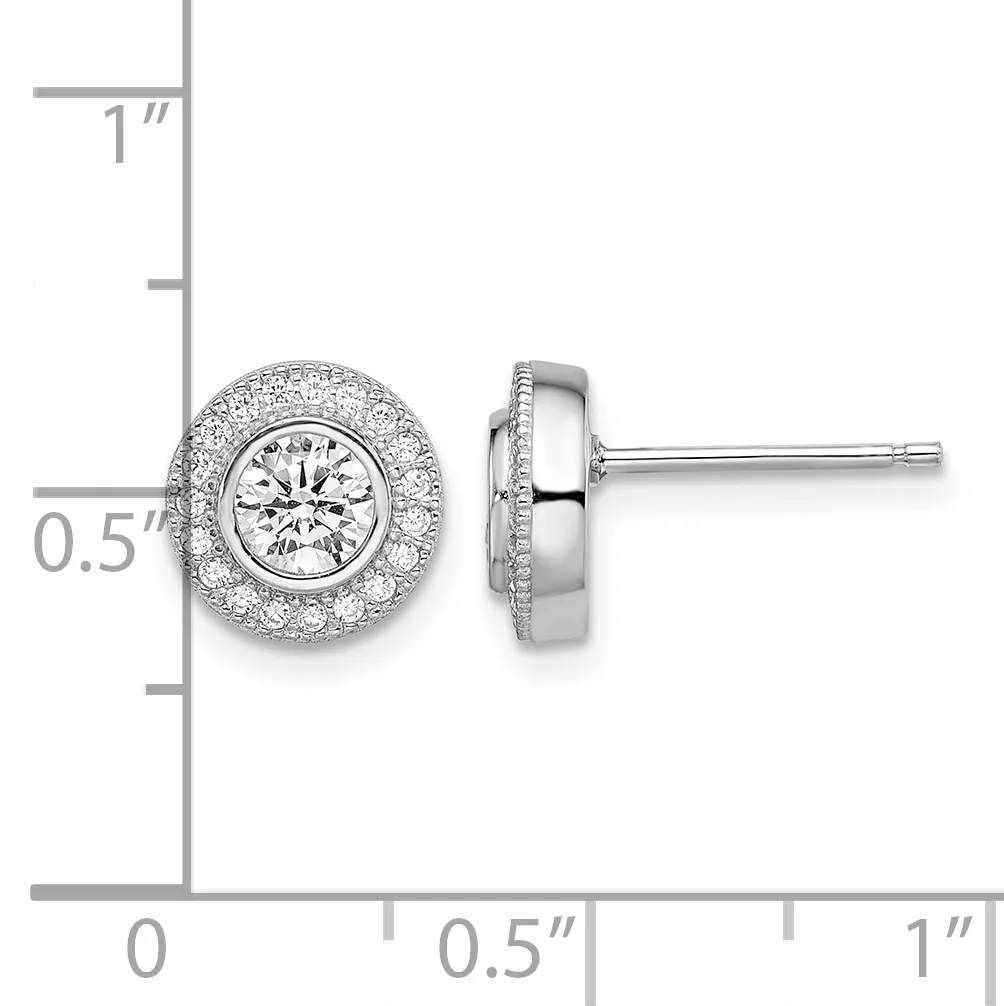 A pair of round diamond stud earrings with bezel settings surrounded by pavé diamond halos, shown front and side view against a measurement scale.