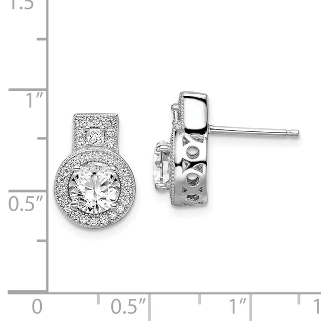 A pair of silver stud earrings with round diamond centers surrounded by halos of smaller diamonds, shown from front and side views against a measurement scale.