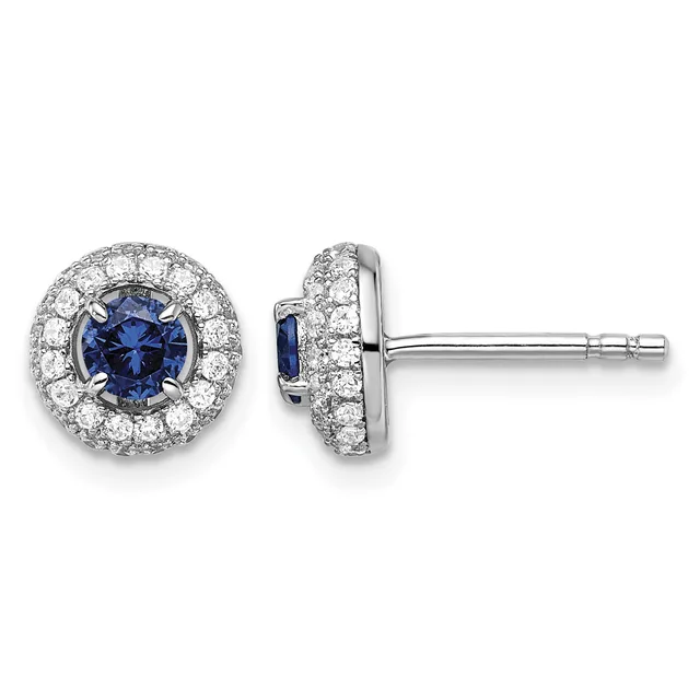 Pair of round stud earrings with blue sapphire centers surrounded by diamond halos in white metal, shown from front and side views.