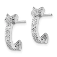 A pair of white metal J-shaped hoop earrings with diamond pavé settings along the curved sides and larger stones at the top, shown from the front.