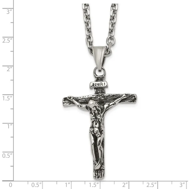 Stainless steel antiqued crucifix pendant with INRI inscription on a chain necklace, shown against a white background with inch measurement rulers.