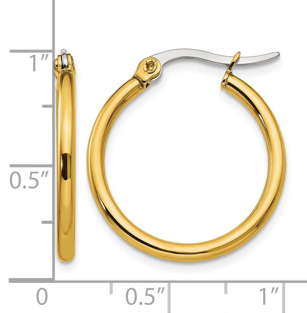 A pair of polished yellow gold hoop earrings with a silver snap closure, shown next to a ruler indicating approximately 1 inch in diameter.
