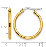 A pair of polished yellow gold hoop earrings with a silver snap closure, shown next to a ruler indicating approximately 1 inch in diameter.