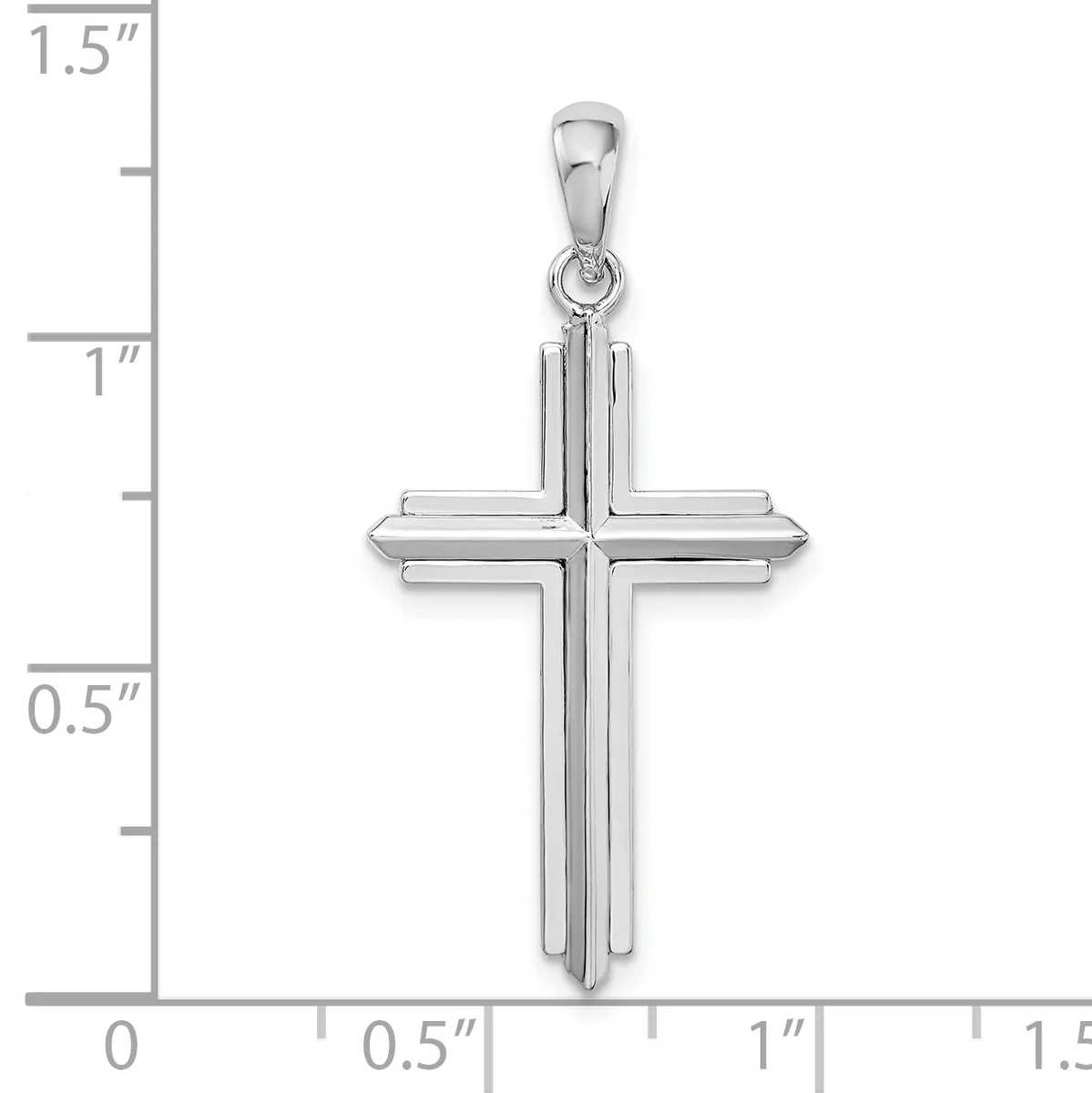 A polished silver cross pendant with layered rectangular arms and a small loop at the top, shown against a measurement scale indicating approximately 1.25 inches in height.