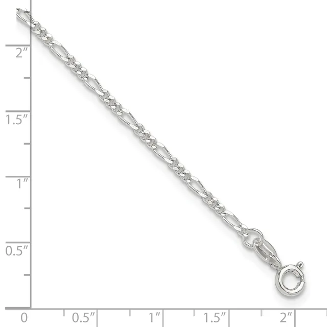 Silver chain necklace with decorative links displayed against a measurement ruler showing it is approximately 2 inches long.