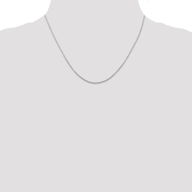 A thin silver chain necklace displayed on a mannequin torso against a white background.