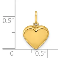 Polished gold-colored heart pendant with bail and loop, shown next to a measurement scale indicating approximately 0.5 inches in width and height.