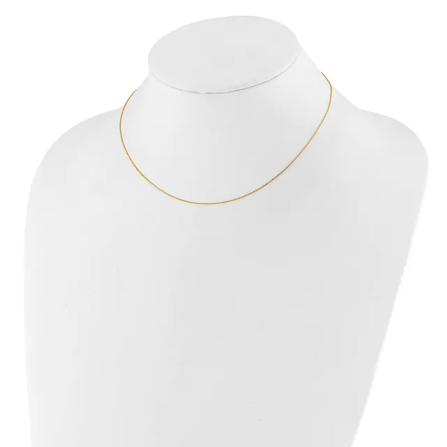 A delicate gold-toned chain necklace displayed on a white mannequin bust.