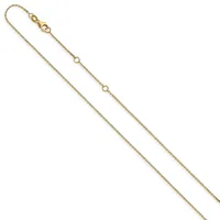 A delicate gold chain necklace with a lobster claw clasp at the top and small circular open link accents spaced along its length.
