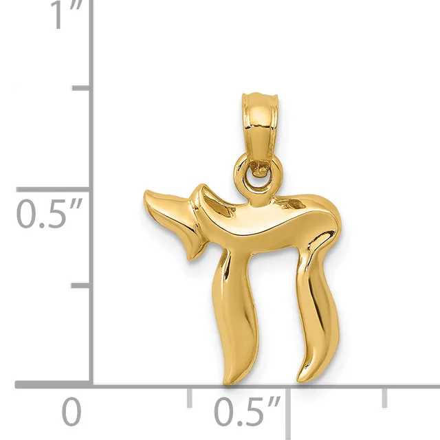 Gold pendant in the shape of a Hebrew letter chai with a polished finish and bail loop, shown next to a ruler indicating its size is approximately one inch tall.