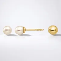 A pair of gold stud earrings with pearl spheres displayed alongside a single matching gold sphere earring, shown from front and side angles.