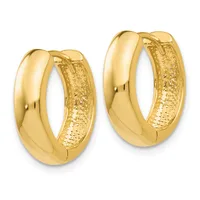 A pair of polished gold hoop earrings with textured inner surfaces, shown against a white background.
