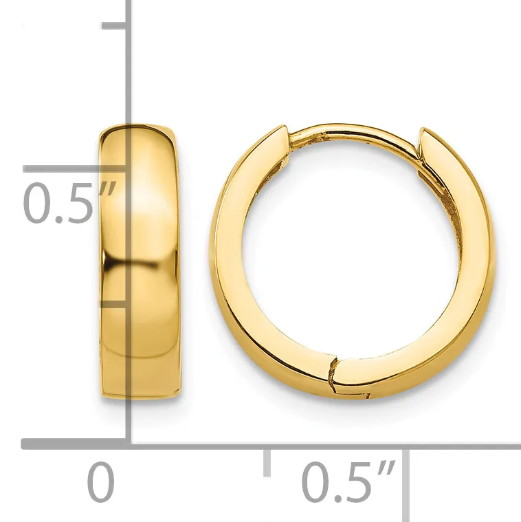 A pair of polished gold-toned chunky hoop earrings with a hinged closure, shown against a measurement scale indicating approximately 0.5 inches in width.