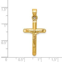 A gold crucifix pendant with a polished finish, displayed next to a measurement scale showing it is approximately one inch wide and one and one-half inches tall.
