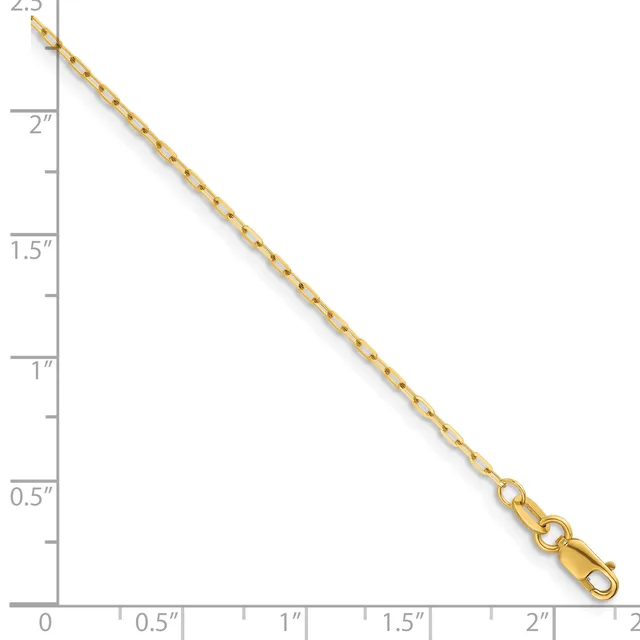 A gold-colored chain with a dotted pattern extends diagonally across a ruler, measuring approximately 2.5 inches in length, with a lobster clasp at one end.