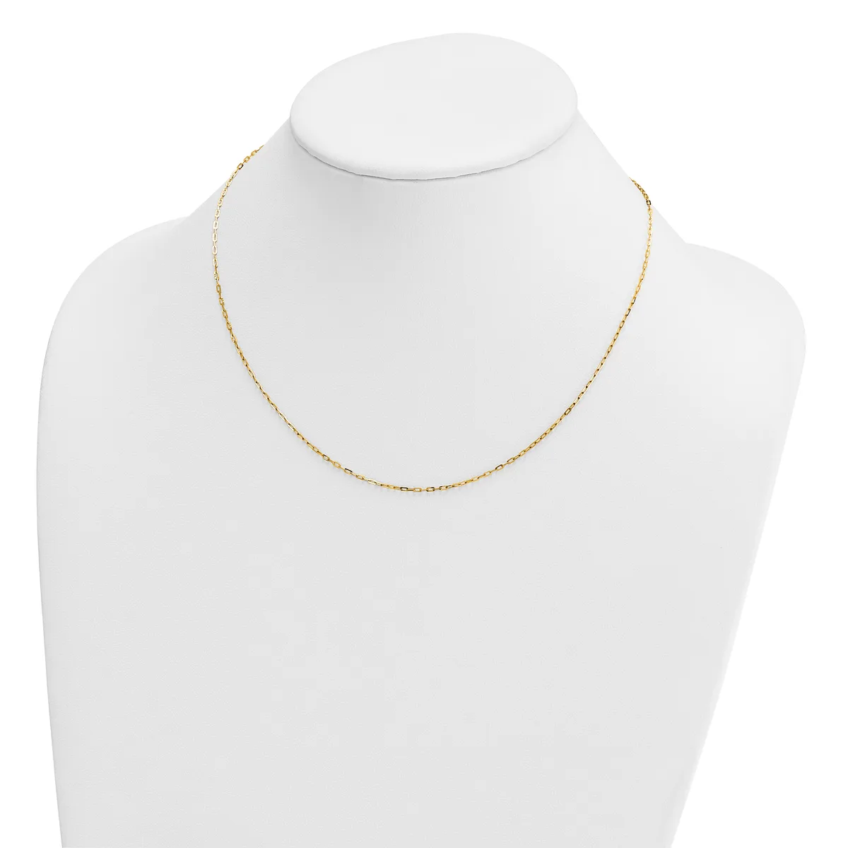 A delicate gold-toned chain necklace displayed on a white mannequin bust.