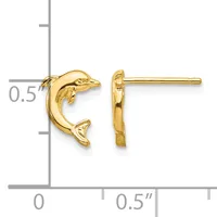 A pair of gold dolphin stud earrings shown from front and side views next to a ruler indicating approximately half-inch size.