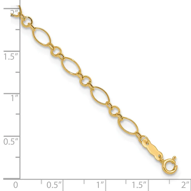 Gold-colored chain bracelet with alternating oval and circular links, displayed against a ruler showing approximately 2 inches in length.