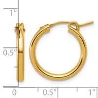 A pair of polished gold hoop earrings with a measurement scale showing approximately one inch in height and half inch in width.
