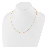 A thin gold-toned chain necklace displayed on a white mannequin bust.