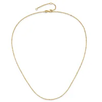 A delicate gold chain necklace with a lobster clasp and adjustable extension chain displayed against a white background.