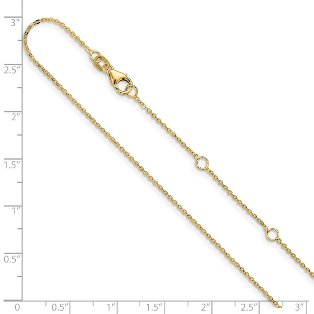 Gold-toned chain bracelet with lobster clasp and small circular link stations along its length, displayed against a ruler showing approximately 3 inches.