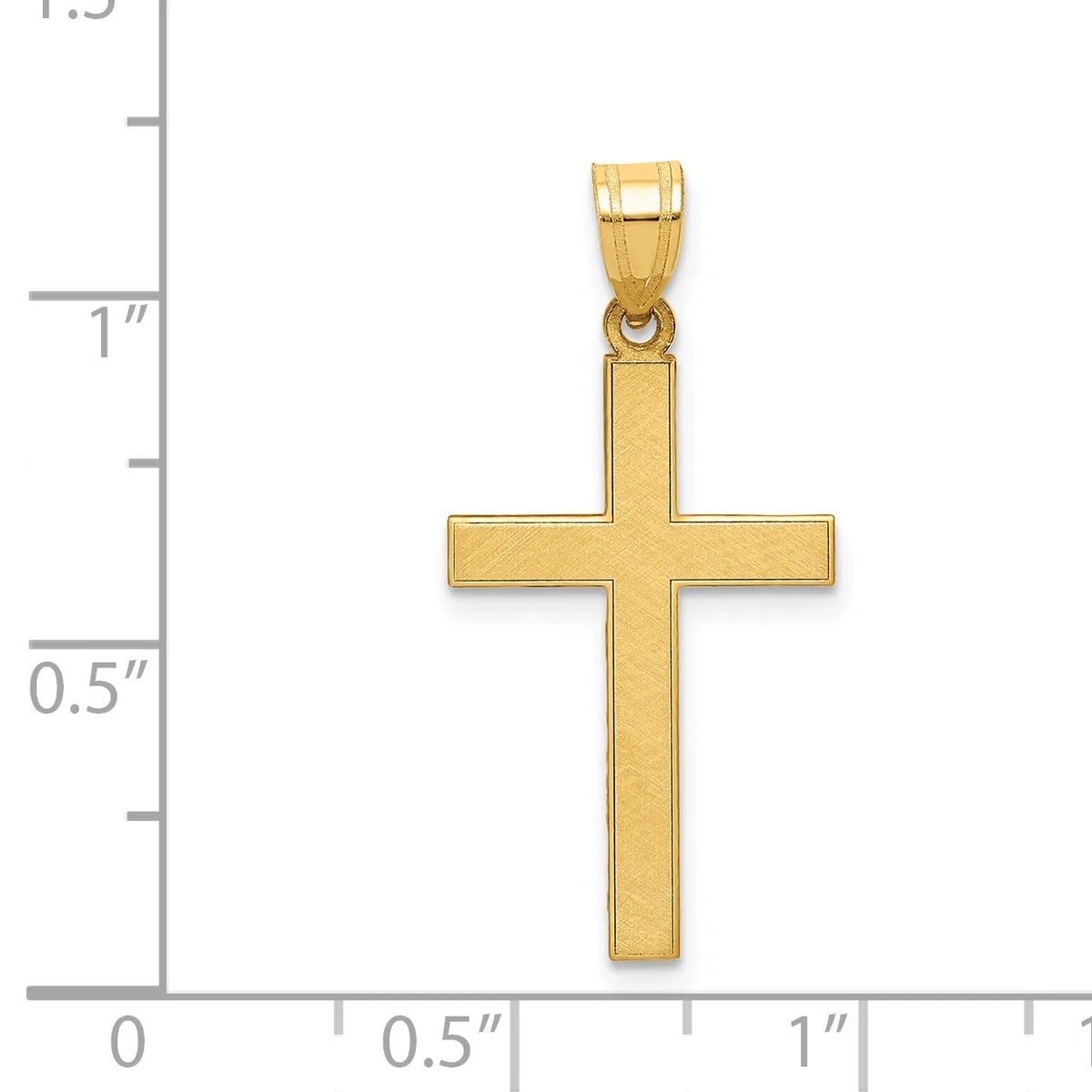 A gold cross pendant with a polished finish, shown against a measurement scale indicating approximately one inch in height.