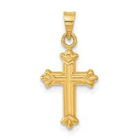 A gold cross pendant with ornate flared ends and a rectangular bail attached to the top.