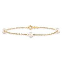 Gold chain bracelet with three white pearl stations and a spring ring clasp, displayed against a white background.