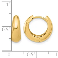 A pair of polished gold-toned chunky hoop earrings displayed next to a ruler showing they measure approximately half an inch in width and three-quarters of an inch in height.