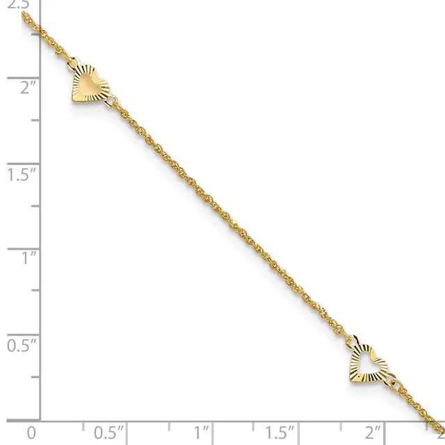 Gold-toned chain bracelet with two small fan-shaped pendants, displayed against a ruler showing approximately 2.5 inches in length.