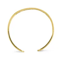 Open-ended gold cuff bracelet with a textured hammered finish throughout, shown against a white background.