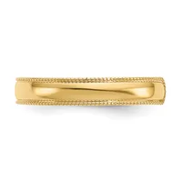 A polished gold band ring with textured milgrain edging along the top and bottom borders, shown on a white background.