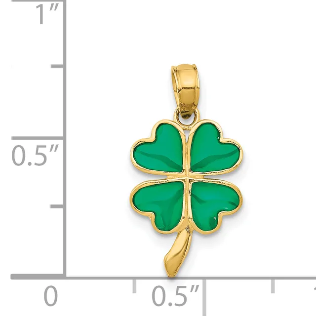 Gold-toned four-leaf clover pendant with green enamel inlay and small hallmark, shown against a ruler displaying approximately 0.75 inches in height.