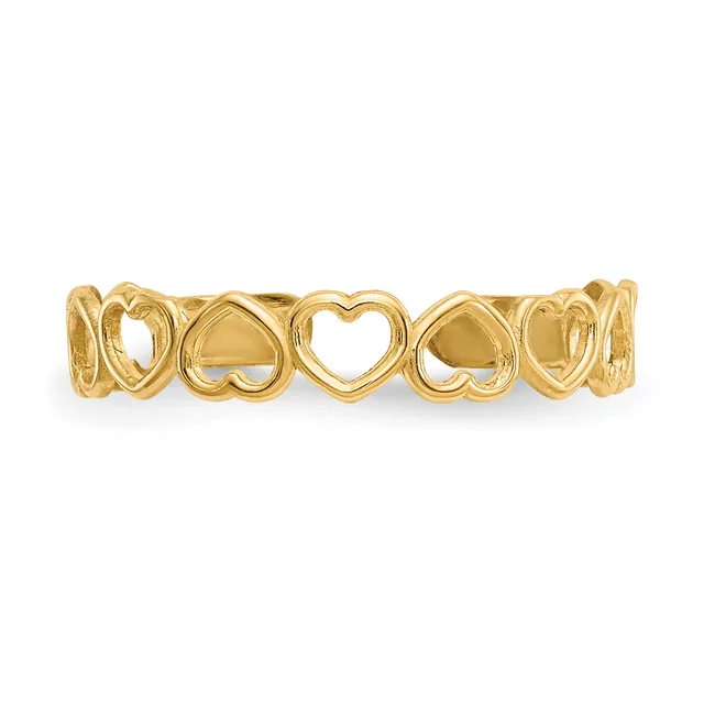 Gold-toned bangle bracelet with repeating open heart cutout design arranged in a continuous pattern around the band.