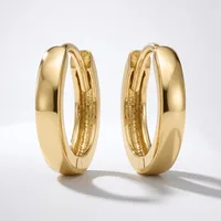 A pair of polished gold hoop earrings with a smooth, rounded profile, shown from the front and side view against a white background.