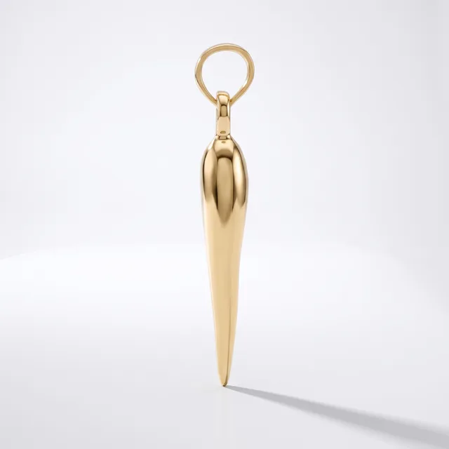 A polished gold-toned pendant in an elongated tapered shape with a rounded top, suspended from a matching ring loop against a white background.